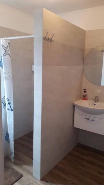 Фото номера Апартаменты с 2 спальнями Мини-отель Cottage The garden г. Брест 7