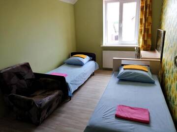 Фото номера Трехместный номер Гостевой дом Cottage at Utrennyaya Street г. Брест 5