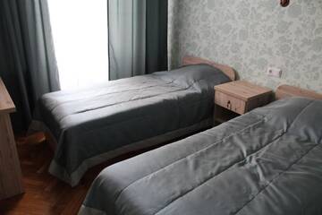 Фото номера Стандартный двухместный номер с 2 отдельными кроватями Отель Hotel Byg г. Брест 3