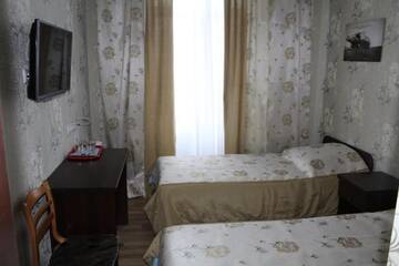 Фото номера Стандартный двухместный номер с 2 отдельными кроватями Отель Hotel Byg г. Брест 6