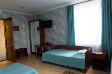 Фото номера Четырехместный номер с душем Отель Hotel Byg г. Брест 3