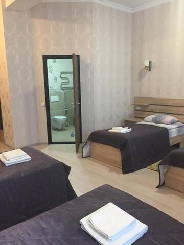 Фото номера Четырехместный номер с душем Отель Hotel Byg г. Брест 10