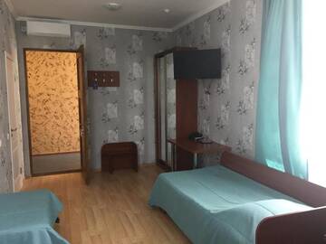 Фото номера Четырехместный номер с душем Отель Hotel Byg г. Брест 7