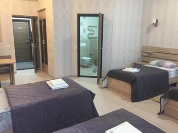 Фото номера Четырехместный номер с душем Отель Hotel Byg г. Брест 8