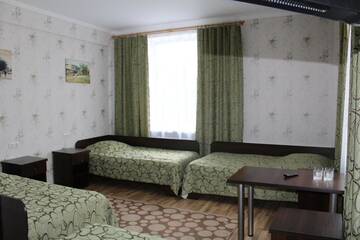 Фото номера Четырехместный номер с душем Отель Hotel Byg г. Брест 4