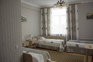 Фото номера Четырехместный номер с душем Отель Hotel Byg г. Брест 5