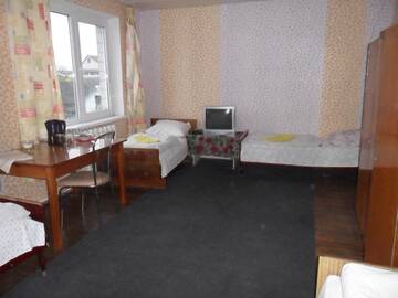 Фото номера Стандартный четырехместный номер Гостевой дом Guest House Raisa г. Брест 3