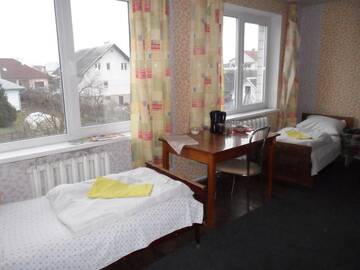 Фото номера Стандартный четырехместный номер Гостевой дом Guest House Raisa г. Брест 5